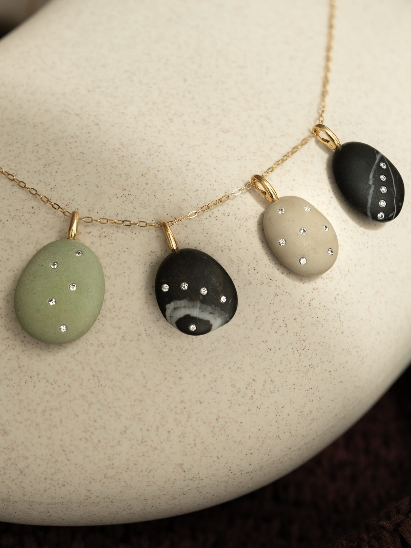 CVC Stones takes natural pebbles and elevates them with diamonds, placed to accentuate their form and color.
Tap the link in bio to shop at #AUBADEJEWELRY.